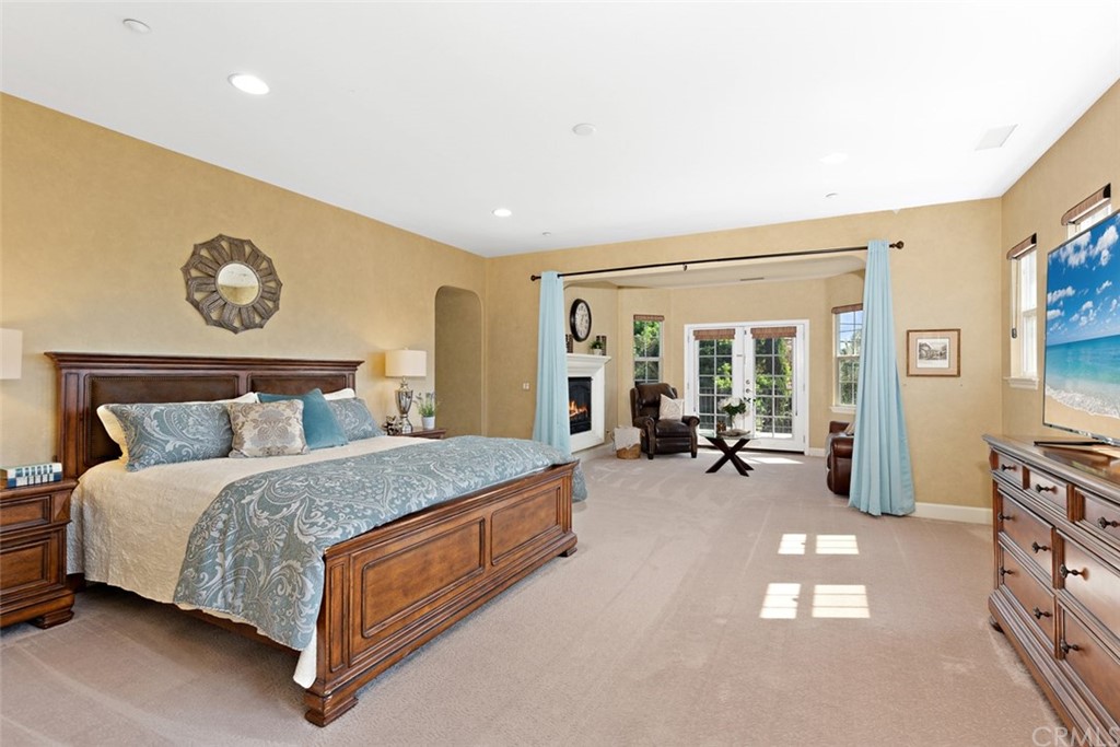 720 West Aster Place Santa Ana, CA 92706 - Photo 23 of 41 a bed room with a bed and dresser