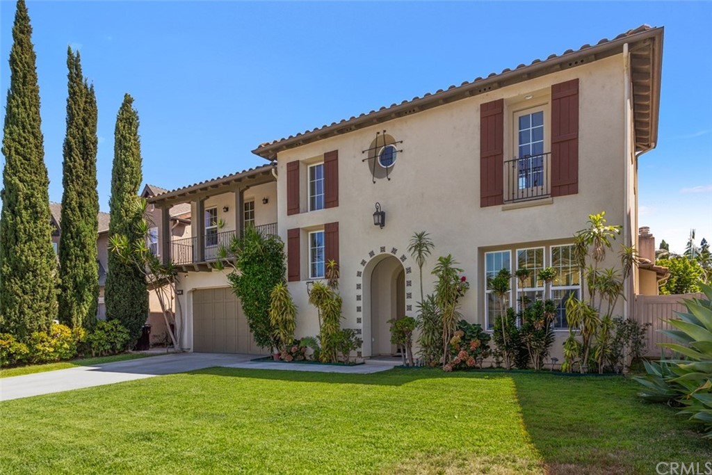 720 West Aster Place Santa Ana, CA 92706 - Photo 40 of 41 a front view of a house with a yard