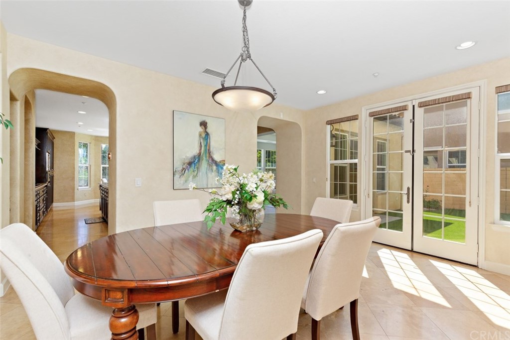 720 West Aster Place Santa Ana, CA 92706 - Photo 5 of 41 a living room with furniture and a large window