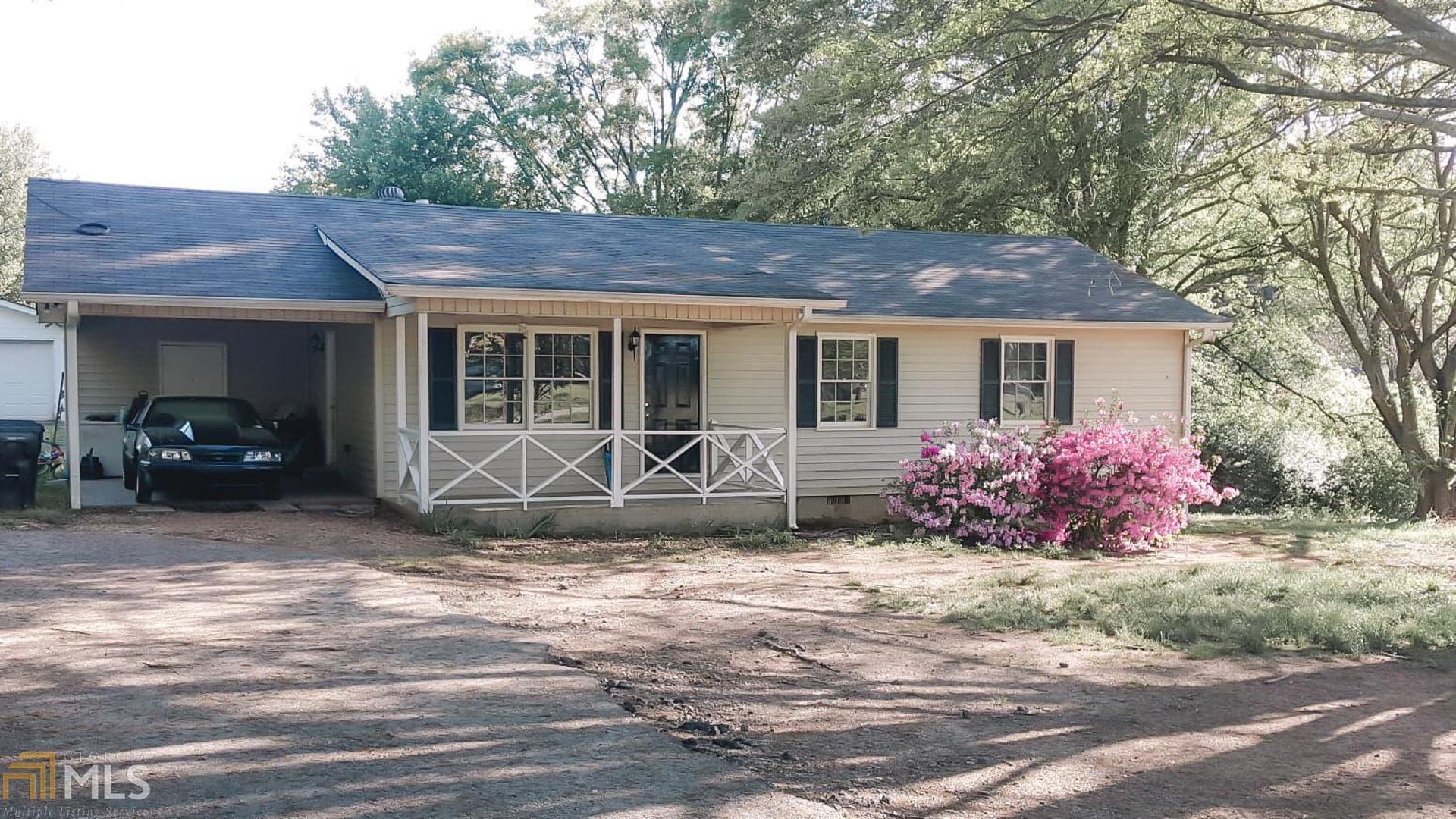 556 Laney Road Locust Grove, GA 30248 - Photo 1 of 1 a view of front a house with a yard