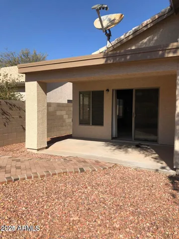 a view of a backyard of a house