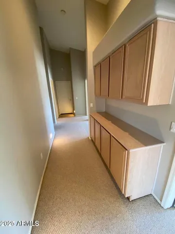 a view of hallway with stairs