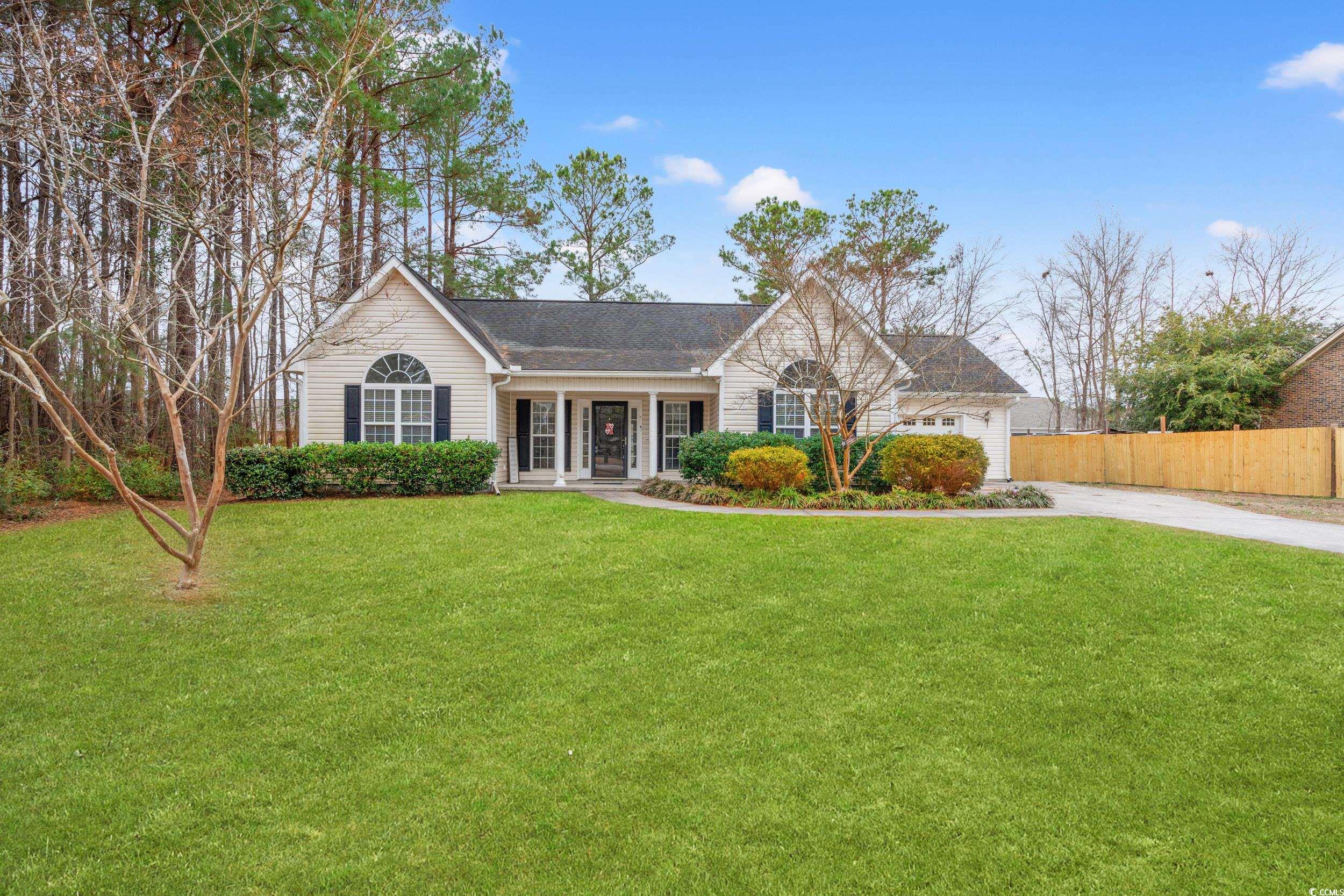 3471 Spivey Street Loris, SC 29569 - Photo 1 of 31 View of front of house featuring a front yard