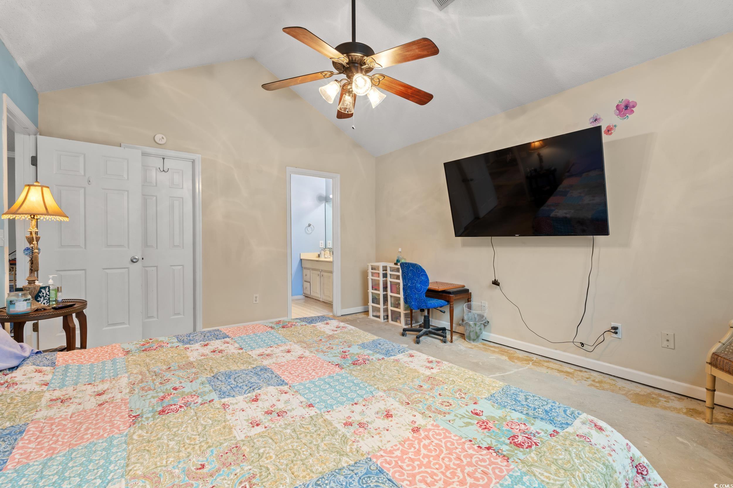 3471 Spivey Street Loris, SC 29569 - Photo 20 of 31 Bedroom featuring connected bathroom, vaulted ceil