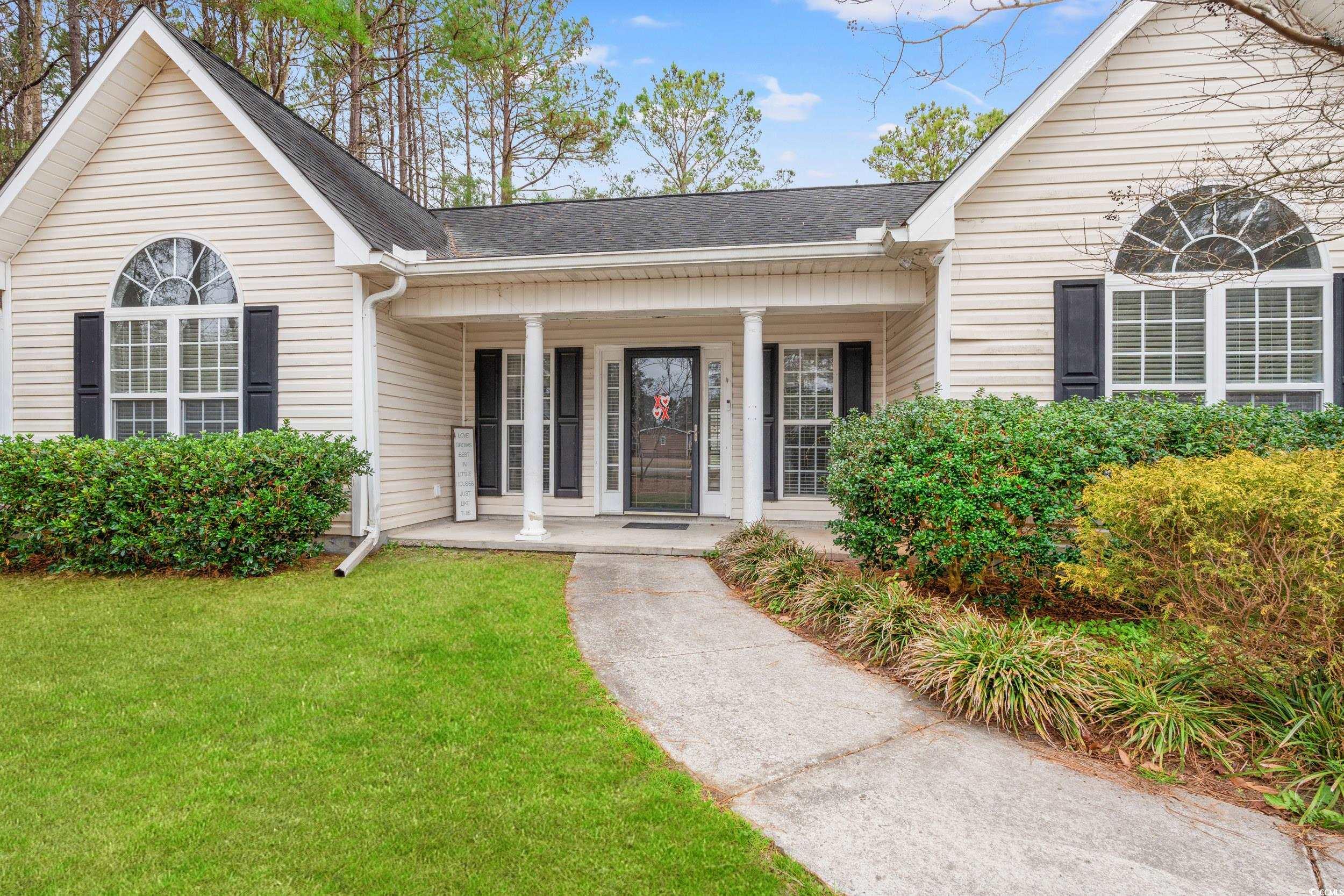 3471 Spivey Street Loris, SC 29569 - Photo 3 of 31 View of front of property featuring a front yard a