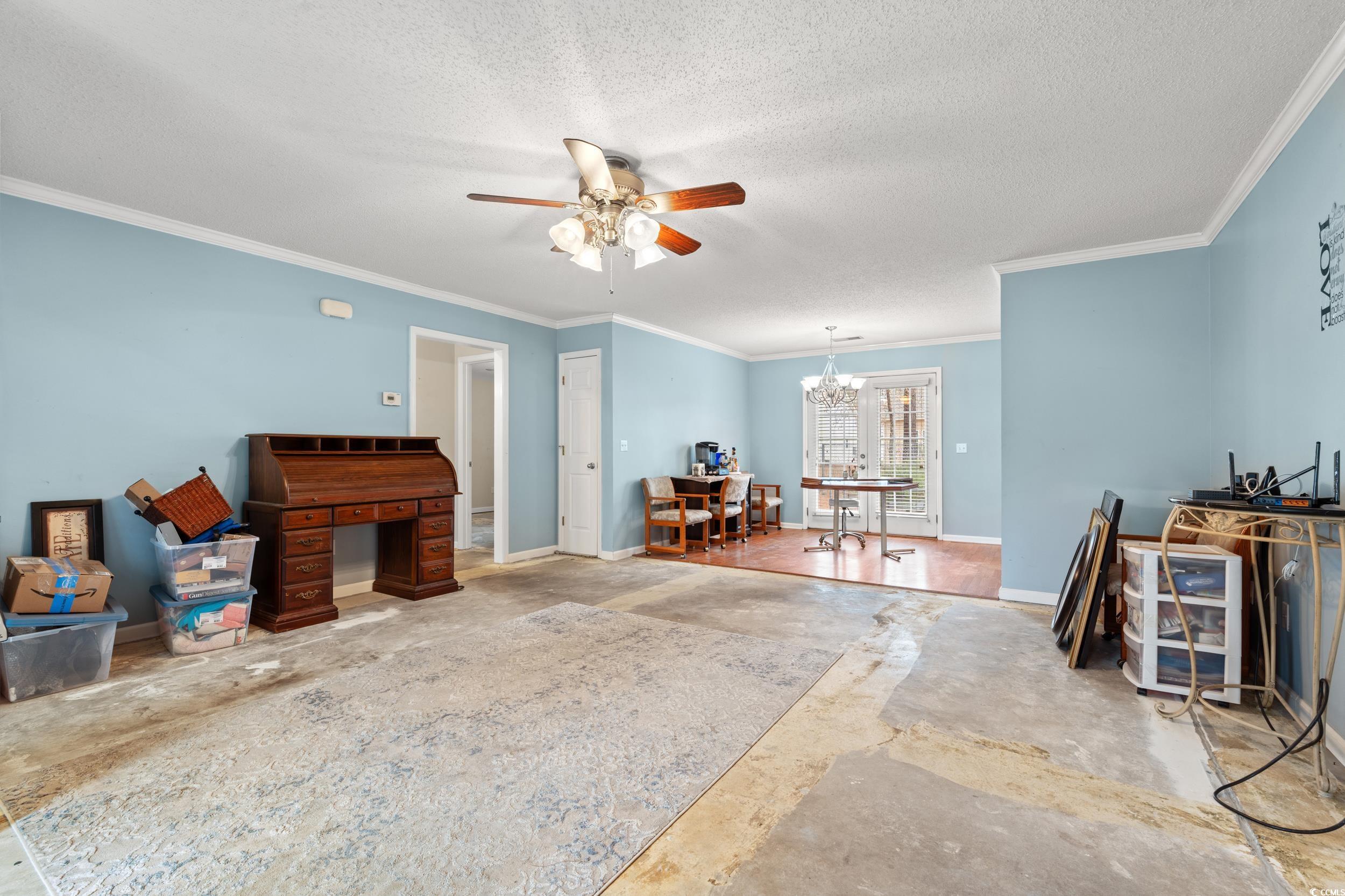 3471 Spivey Street Loris, SC 29569 - Photo 4 of 31 Miscellaneous room with crown molding, ceiling fan