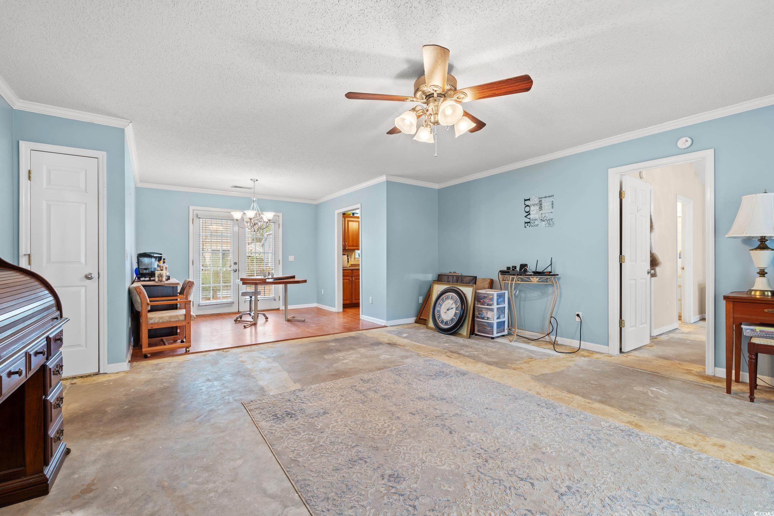 3471 Spivey Street Loris, SC 29569 - Photo 5 of 31 Misc room with ornamental molding, ceiling fan wit