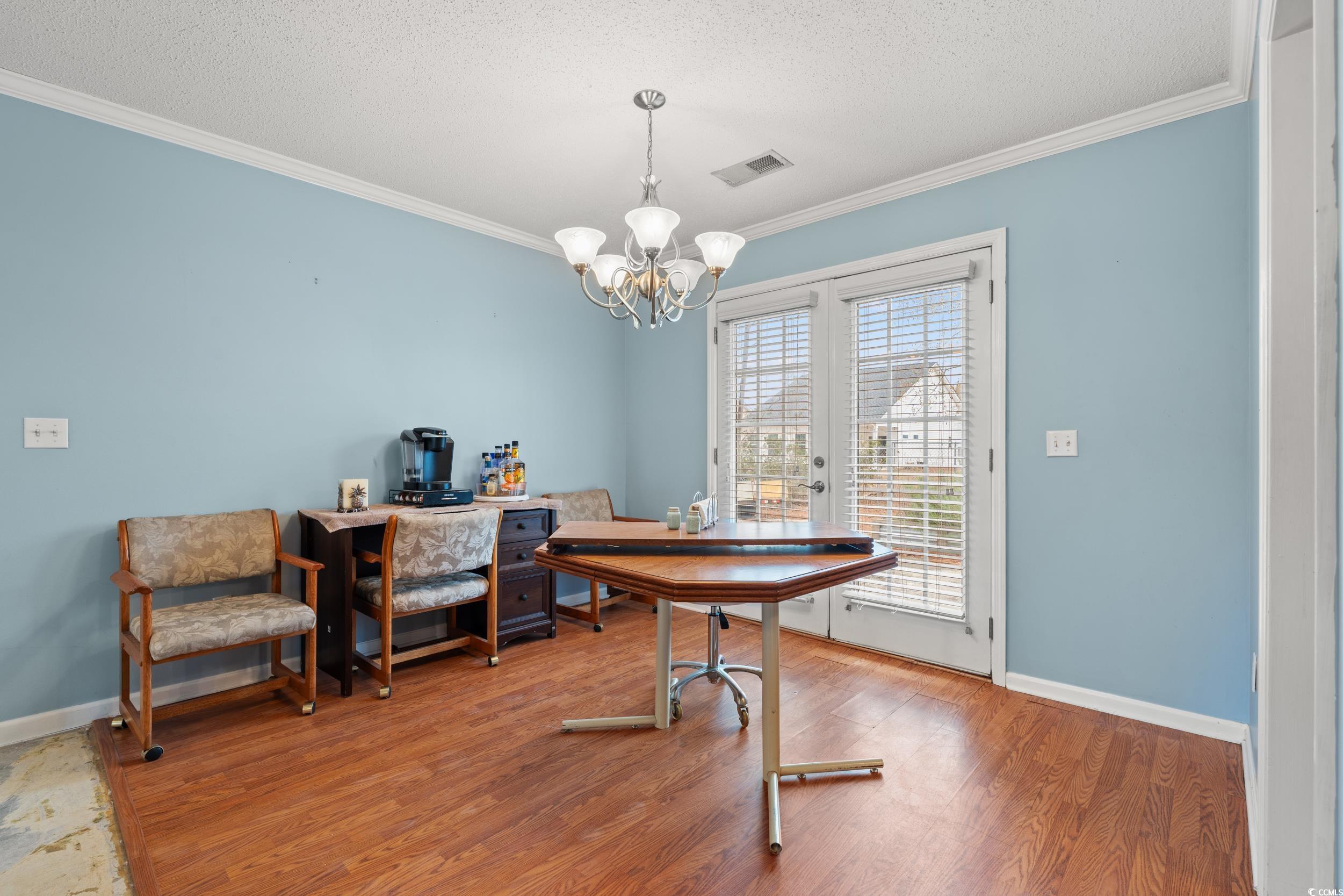 3471 Spivey Street Loris, SC 29569 - Photo 8 of 31 Home office featuring crown molding, hardwood / wo