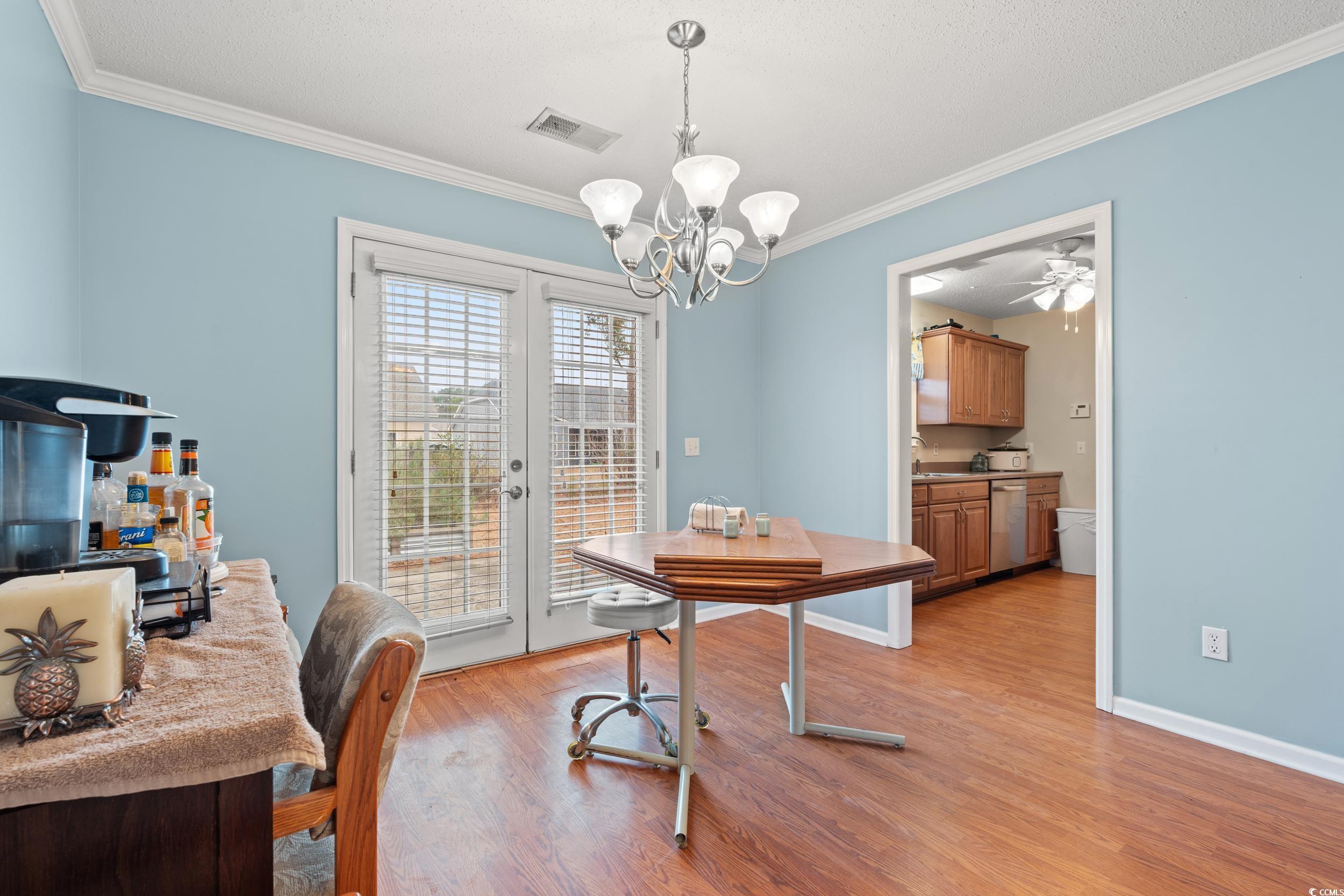 3471 Spivey Street Loris, SC 29569 - Photo 9 of 31 Dining area featuring french doors, sink, an invit