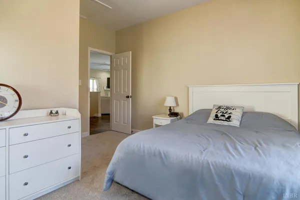 a view of a swimming pool with a yard