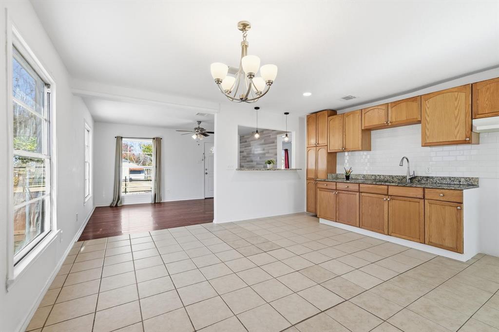 4024 Moler Street Dallas, TX 75211 - Photo 12 of 27 a view of a kitchen with a sink and cabinets