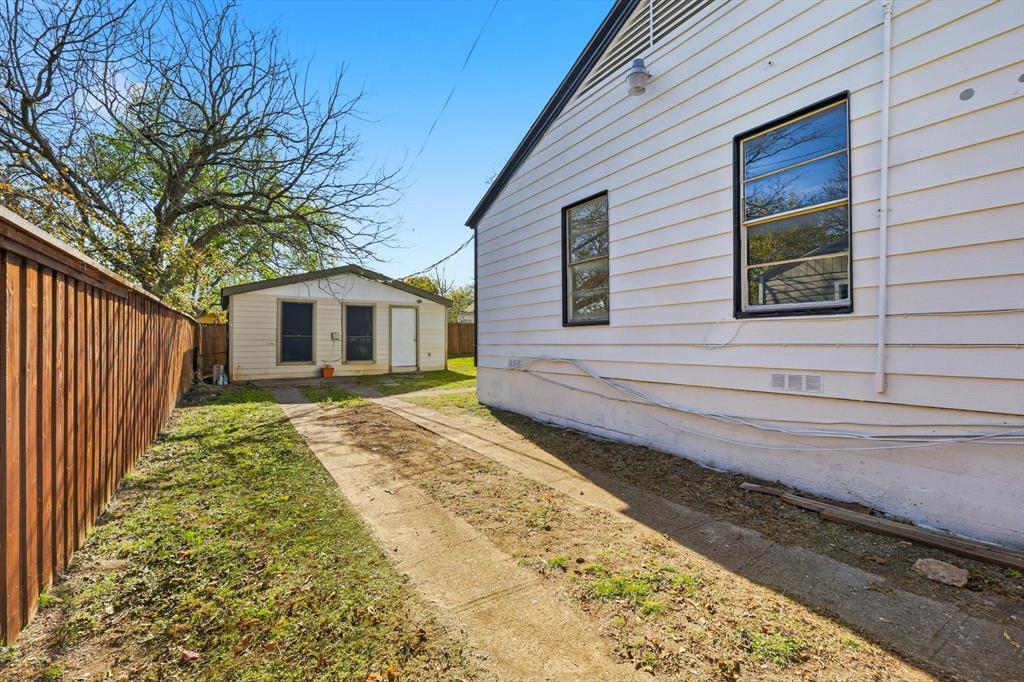 4024 Moler Street Dallas, TX 75211 - Photo 2 of 27 a view of a house with a yard