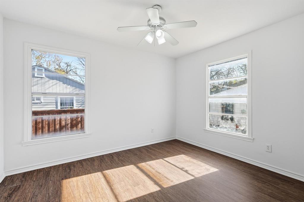 4024 Moler Street Dallas, TX 75211 - Photo 21 of 27 a view of an empty room window and wooden floor