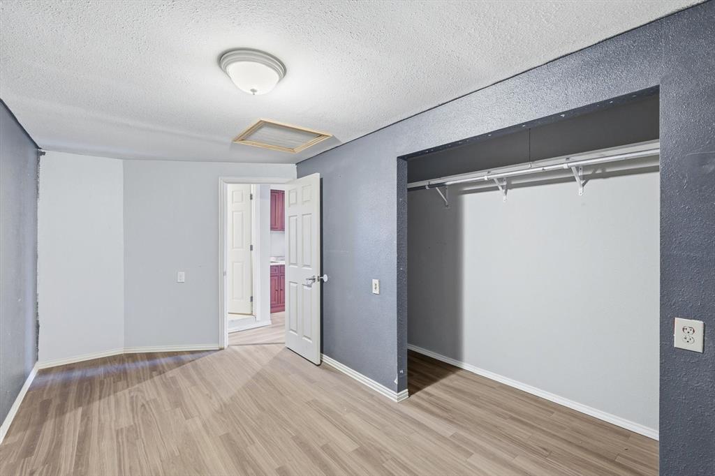 4024 Moler Street Dallas, TX 75211 - Photo 23 of 27 a view of an empty room with wooden floor