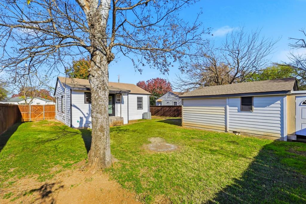 4024 Moler Street Dallas, TX 75211 - Photo 26 of 27 a backyard of a house with seating space