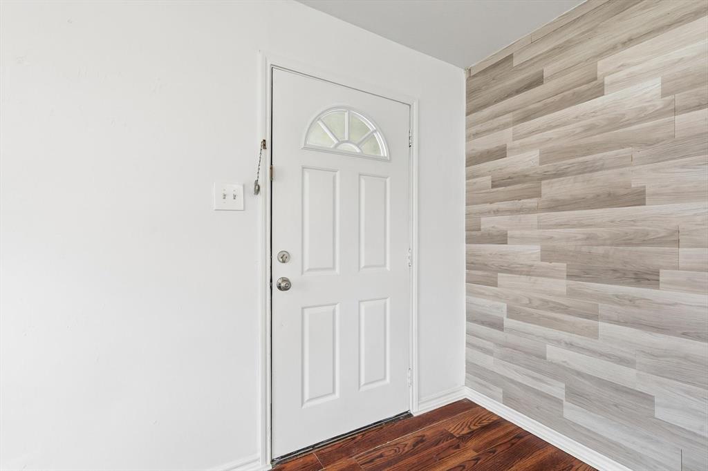 4024 Moler Street Dallas, TX 75211 - Photo 6 of 27 a view of front door with wooden floor