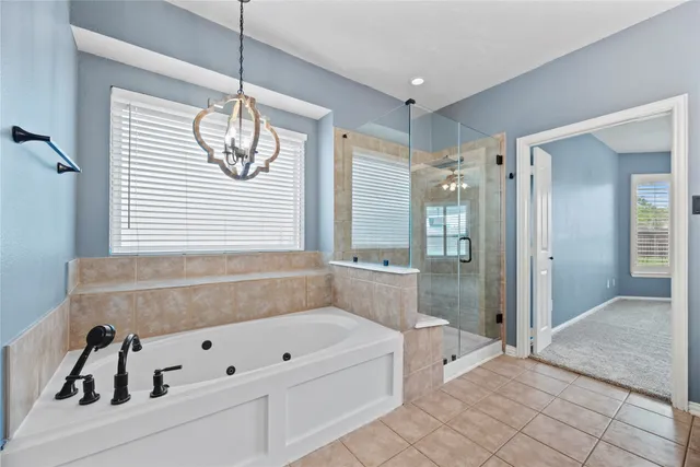 a bathroom with a sink a mirror and a bathtub