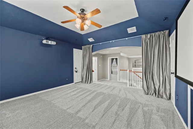 a bathroom with a sink a mirror and a shower