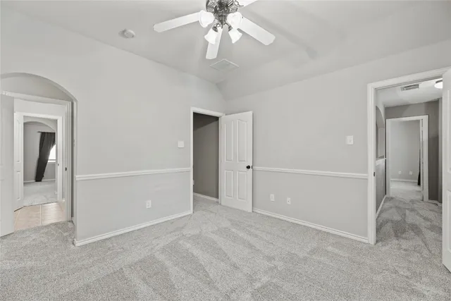 a view of a swimming pool with a yard