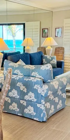 a bathroom with a granite countertop sink mirror vanity and bathtub
