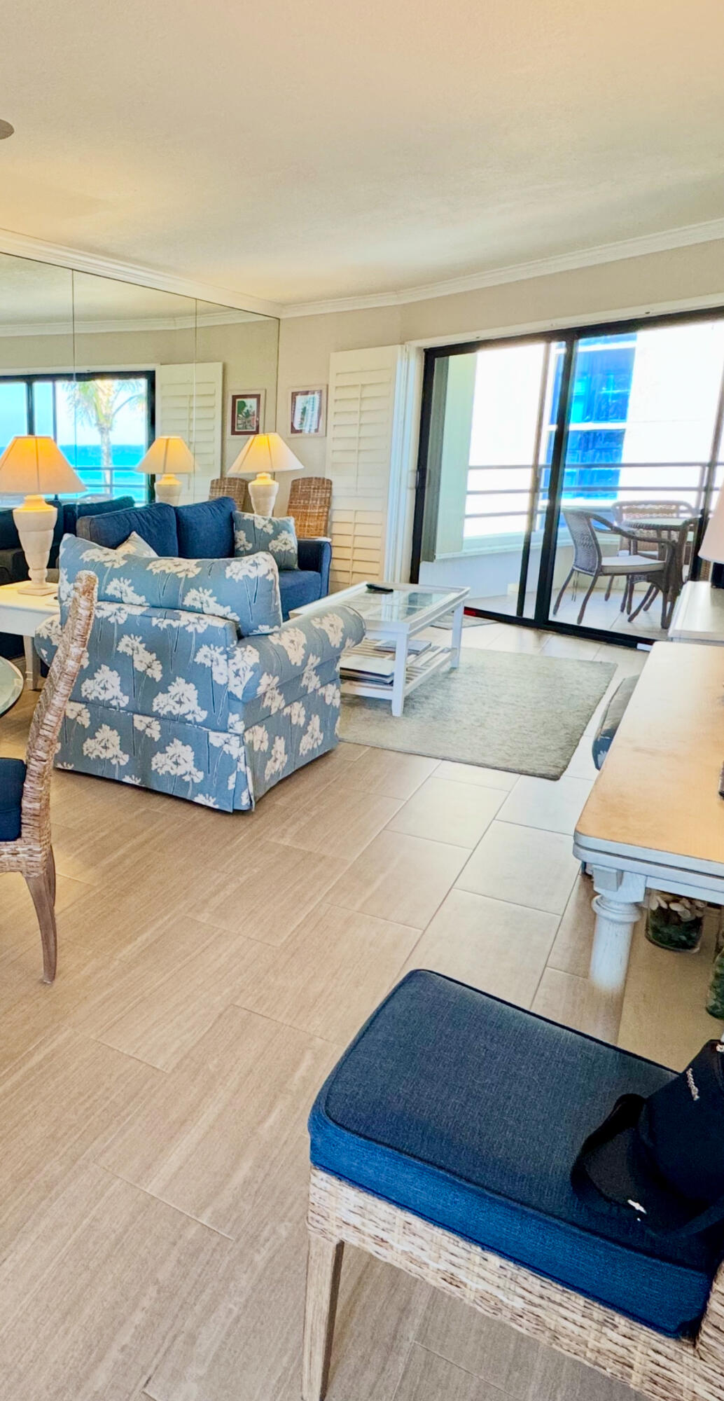 420 Celestial Way, Unit 403 Juno Beach, FL 33408 - Photo 12 of 25 a living room with furniture and a large window