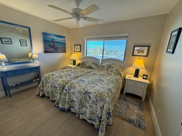 a kitchen with a sink stove top oven and cabinets