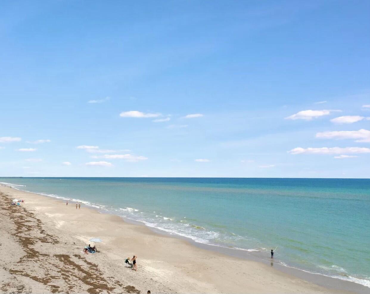 420 Celestial Way, Unit 403 Juno Beach, FL 33408 - Photo 19 of 25 a view of an ocean beach