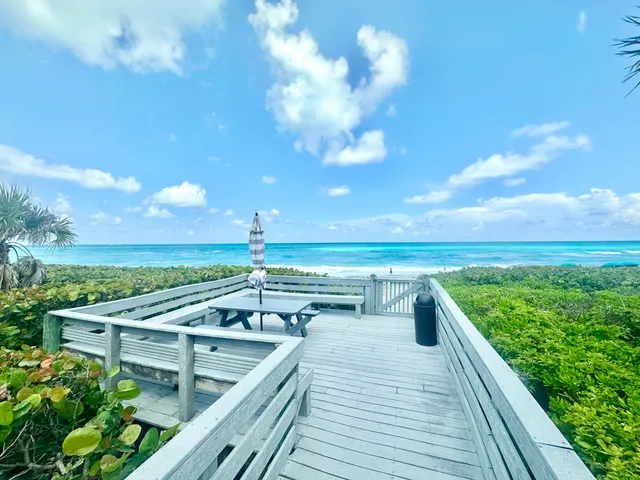 a outdoor space with furniture a flat screen tv
