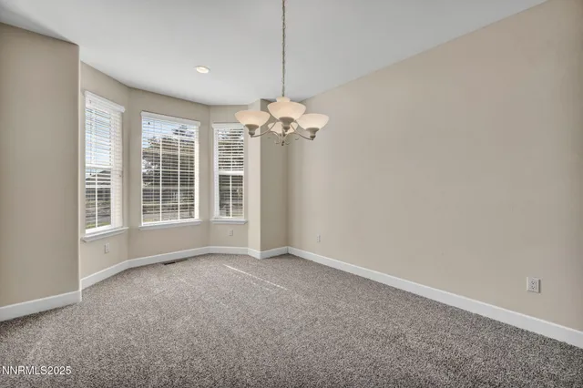 a view of a chandelier in a room