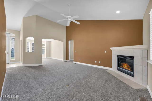a kitchen with stainless steel appliances granite countertop a stove sink and cabinets