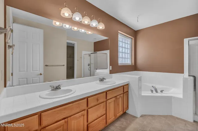 a front view of a house with a yard table and chairs