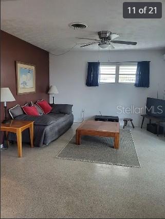 158 Concord Drive Northeast Port Charlotte, FL 33952 - Photo 11 of 21 a bedroom with furniture and a lamp