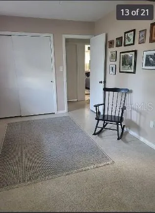 a view of a livingroom with furniture and a couch
