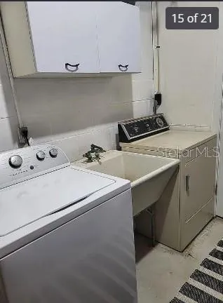 a utility room with dryer and washer