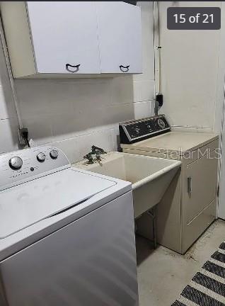 158 Concord Drive Northeast Port Charlotte, FL 33952 - Photo 15 of 21 a utility room with dryer and washer