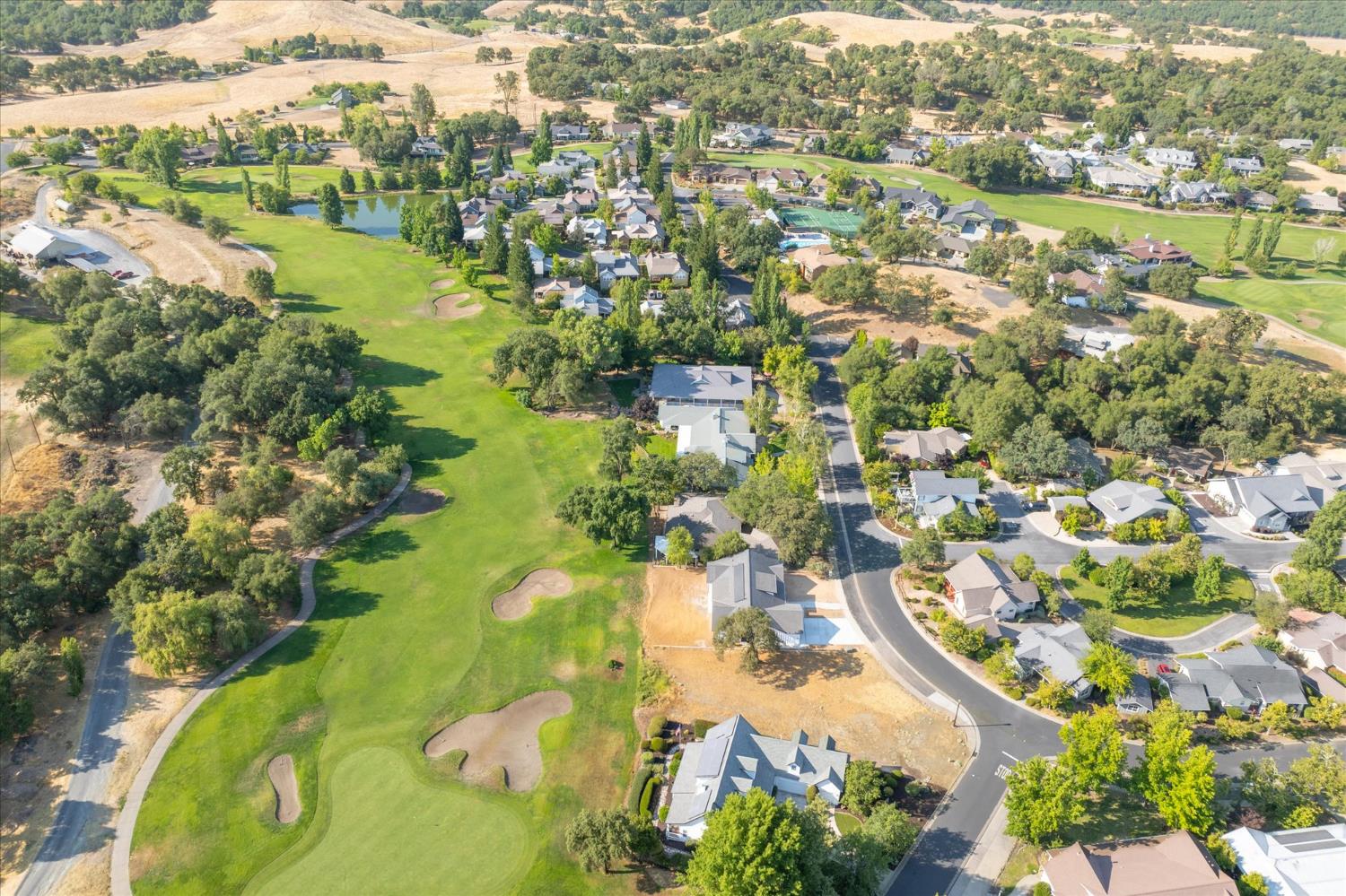 719 Selkirk Ranch Road Angels Camp, CA 95222 - Photo 8 of 12 an aerial view of residential houses with outdoor space and swimming pool