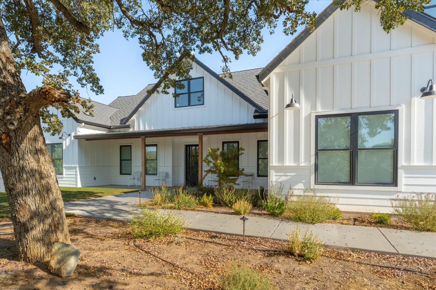 719 Selkirk Ranch Road Angels Camp, CA 95222 - Photo 10 of 12 a front view of a house with garden