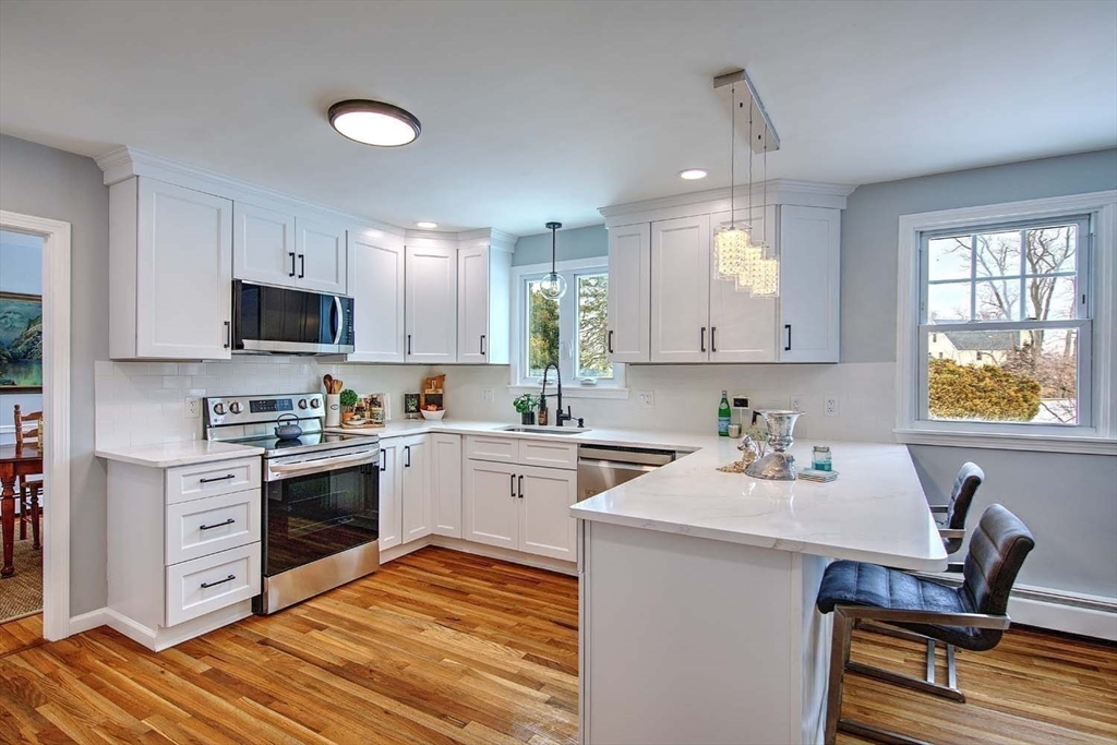 3 Pinetop Road Barrington, RI 02806 - Photo 13 of 38 a kitchen with a sink cabinets and window
