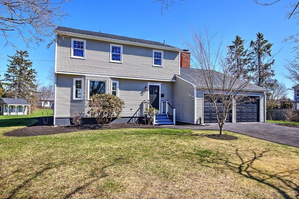3 Pinetop Road Barrington, RI 02806 - Photo 2 of 38 a front view of a house with a yard