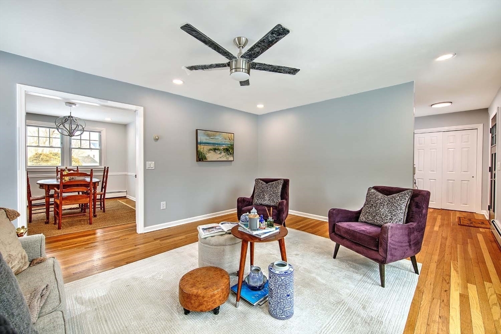 3 Pinetop Road Barrington, RI 02806 - Photo 9 of 38 a living room with furniture and wooden floor
