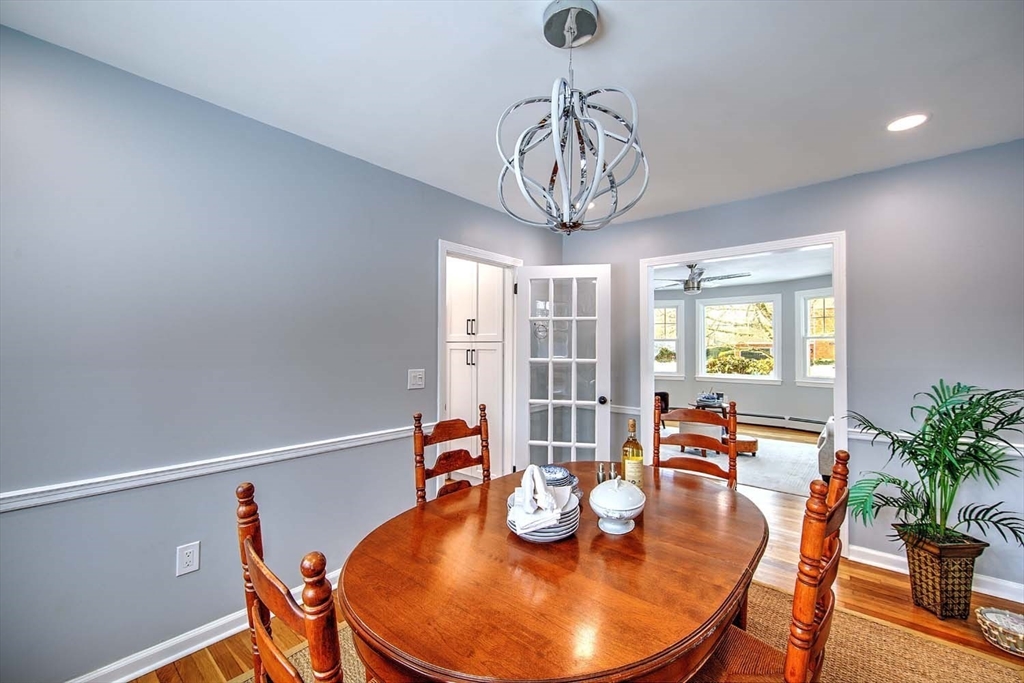 3 Pinetop Road Barrington, RI 02806 - Photo 10 of 38 a view of a dining room with furniture window and wooden floor