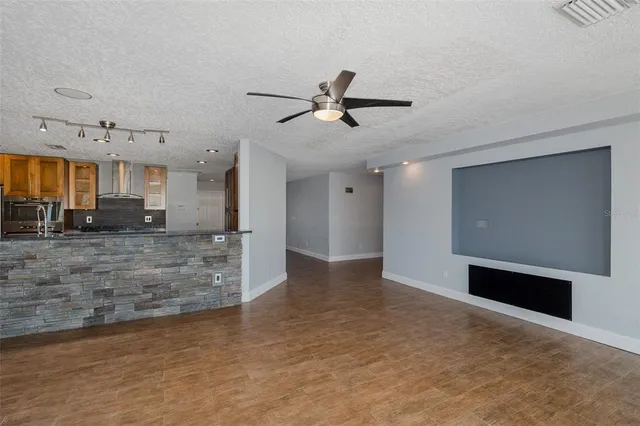 a view of livingroom with furniture wooden floor and window