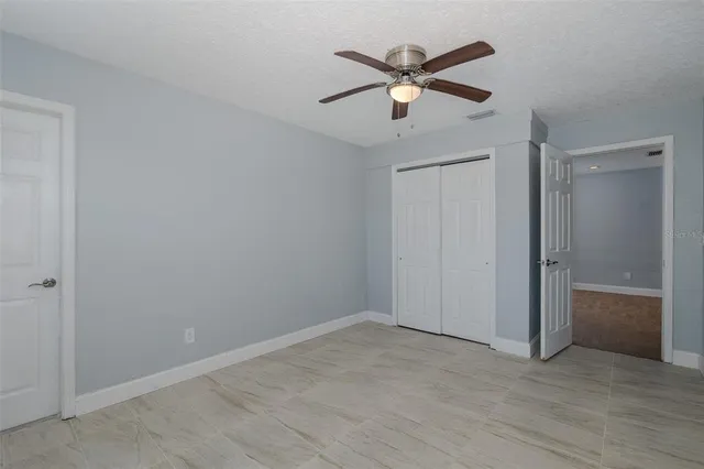 a view of a balcony with chairs