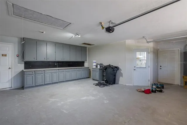 a road view with a building in the background