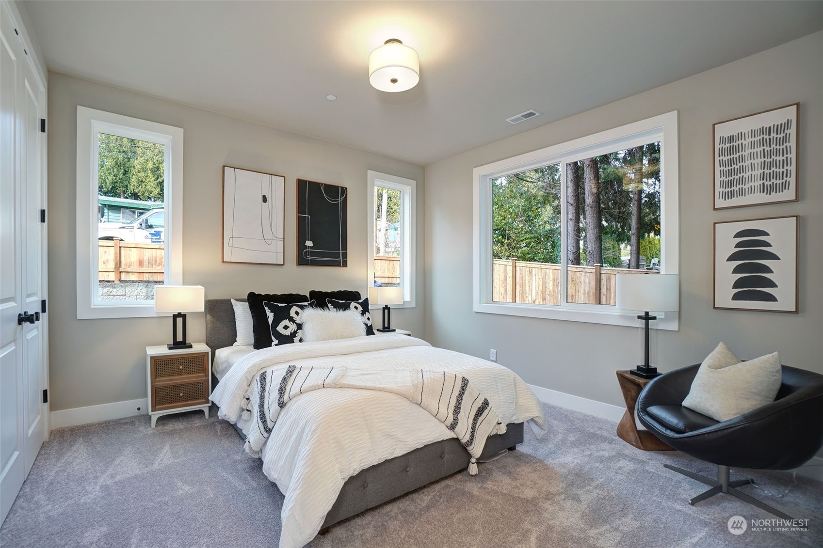 18146 94th Avenue Northeast Bothell, WA 98011 - Photo 15 of 37 a bedroom with a bed and a window
