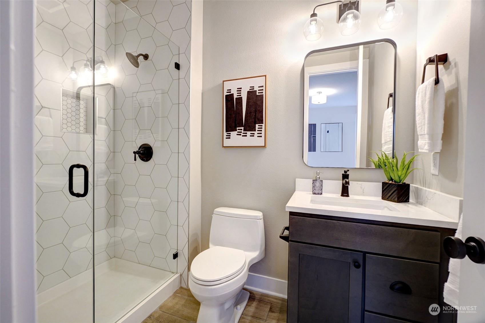 18146 94th Avenue Northeast Bothell, WA 98011 - Photo 16 of 37 a bathroom with a sink a toilet and shower