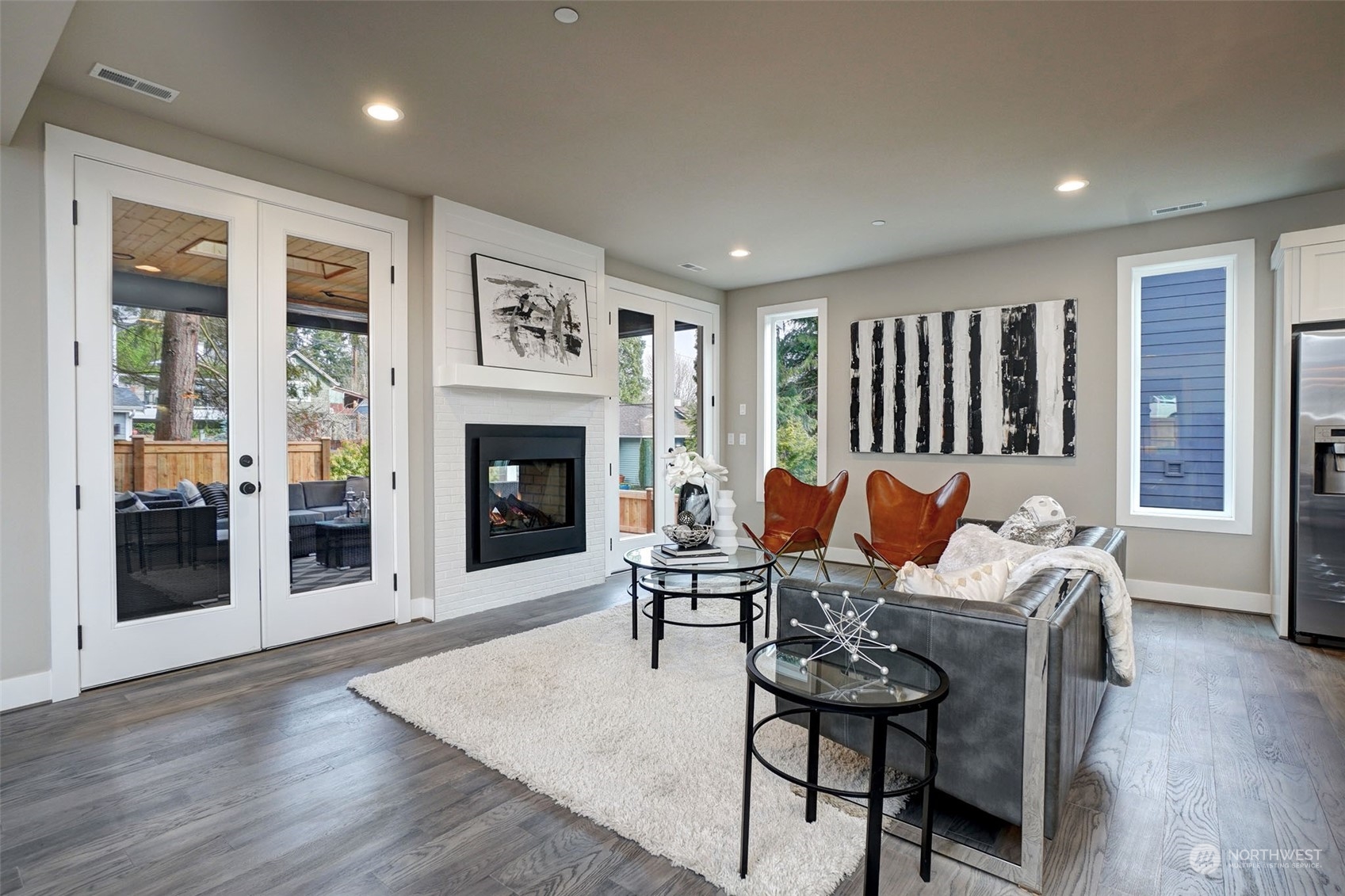 18146 94th Avenue Northeast Bothell, WA 98011 - Photo 2 of 37 a living room with furniture and a fireplace