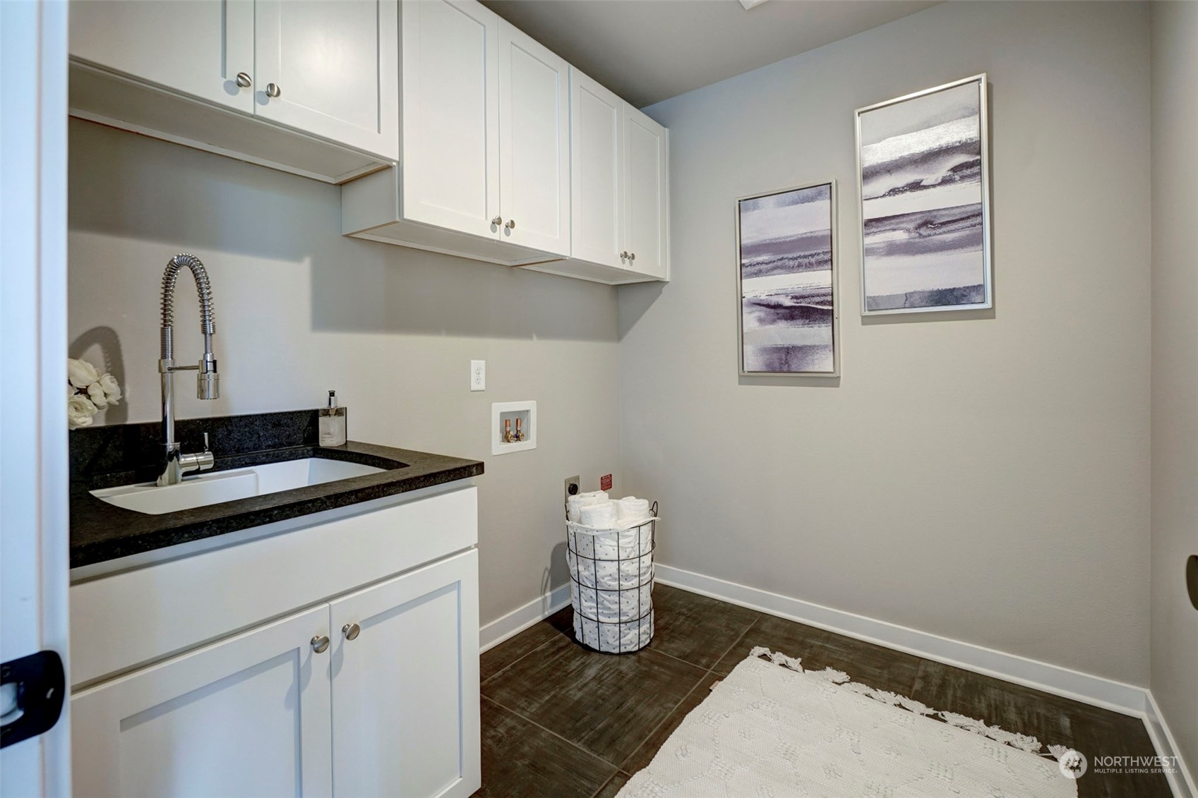 18146 94th Avenue Northeast Bothell, WA 98011 - Photo 24 of 37 a kitchen with a sink and cabinets