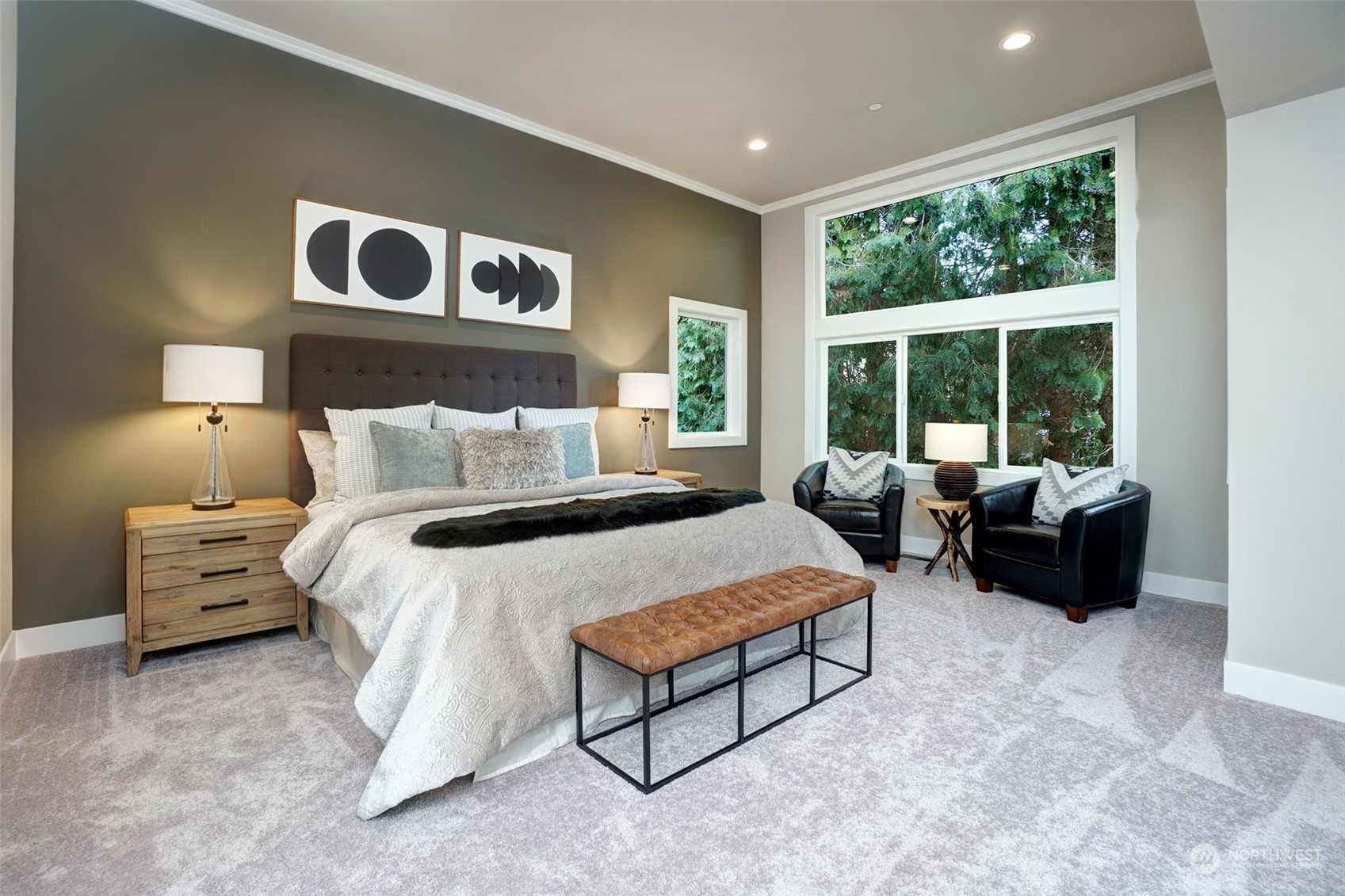 18146 94th Avenue Northeast Bothell, WA 98011 - Photo 26 of 37 a spacious bedroom with a bed and glass window