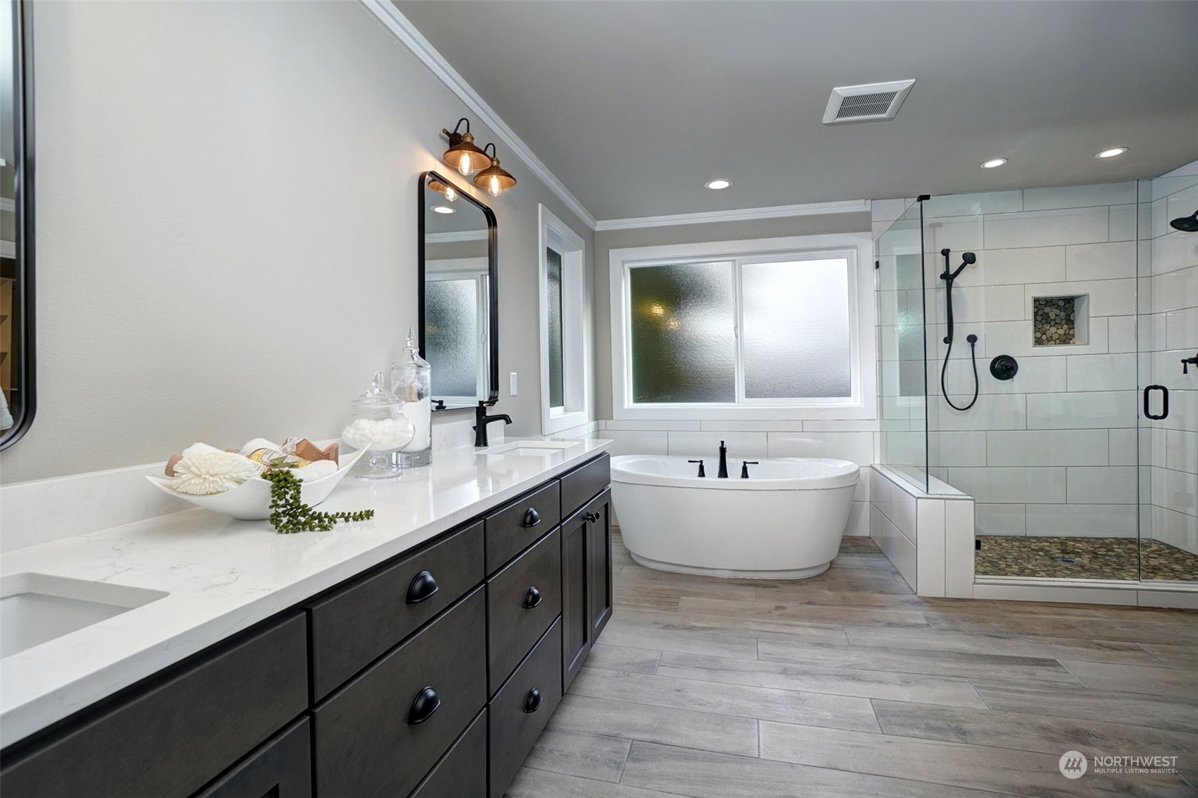 18146 94th Avenue Northeast Bothell, WA 98011 - Photo 29 of 37 a bathroom with a double vanity sink mirror and bathtub
